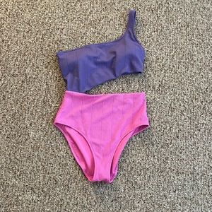 NWOT. Pink/purple aerie one piece size medium